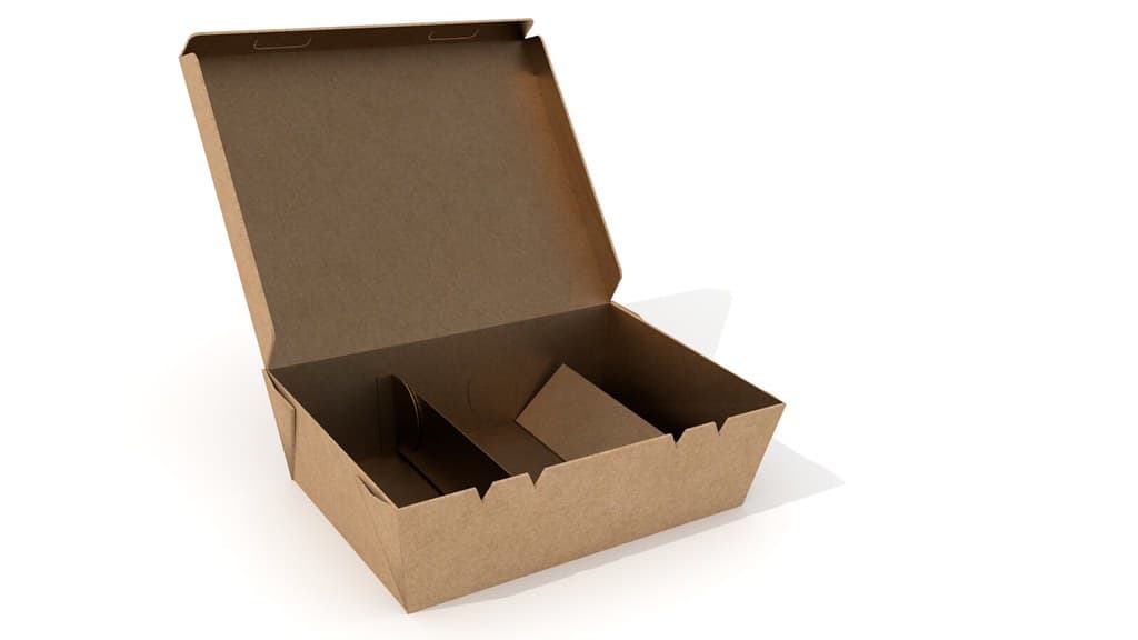 Open kraft cardboard shipping box on a white surface, ready to pack an order